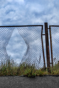 Symbol / Concepts, Iron fence with a large hole Symbol / Concepts, Iron fence with a large hole